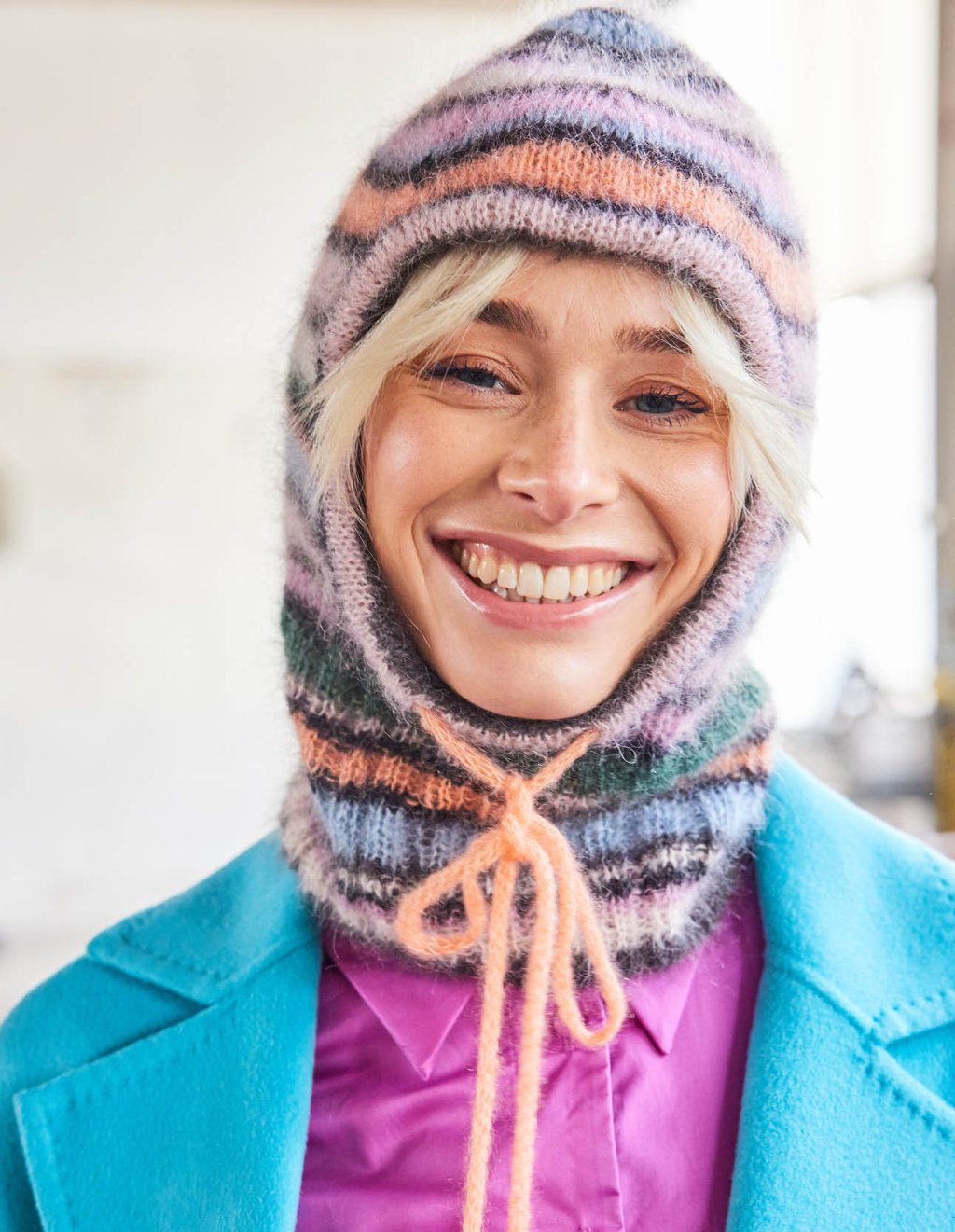 10 Proužkovaná kukla